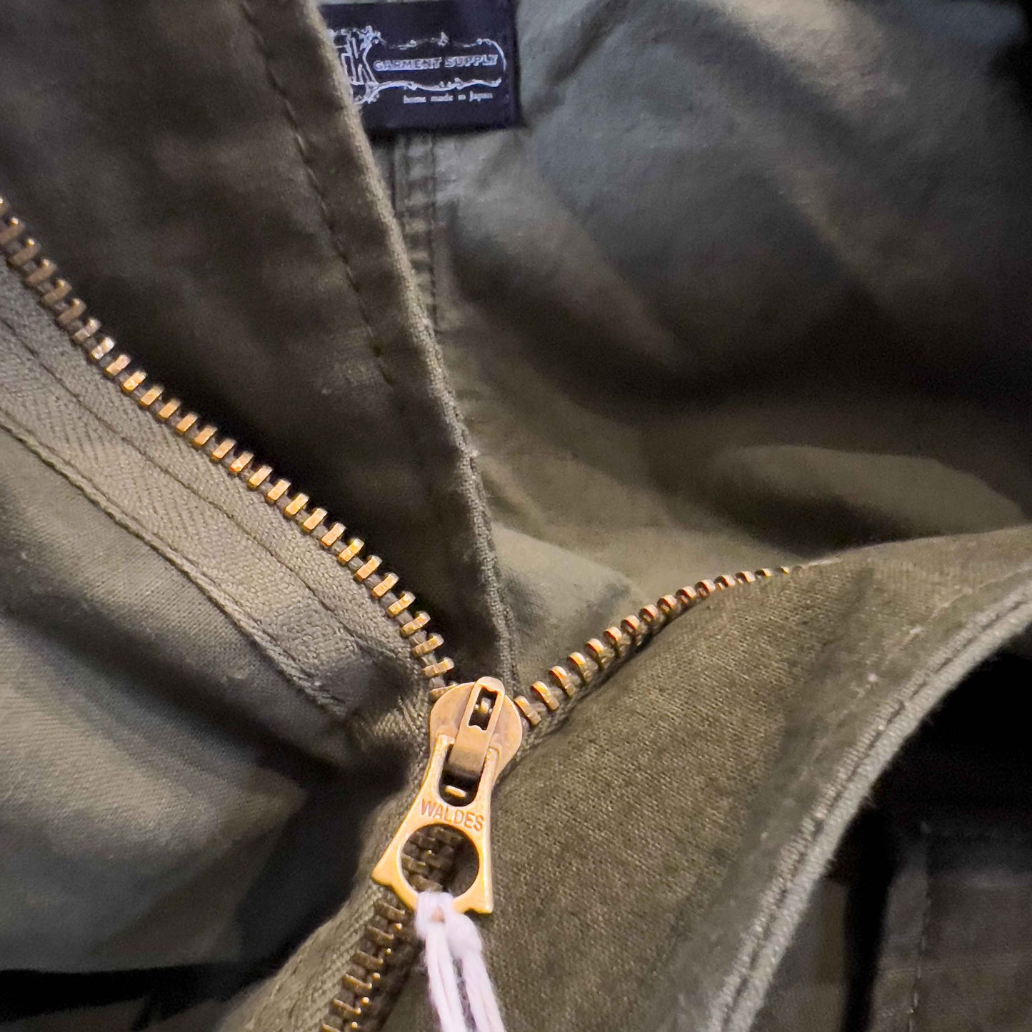 M51 フード付ロングコート(US ARMYヴィンテージクロスリメイク)T.K GARMENT SUPPLY|リメイク・リサイクル・ナチュラルをメインコンセプトとして掲げたブランド チャック部分